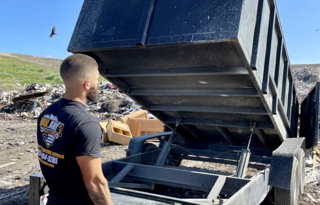 How can I track my return on investment (ROI) for junk removal advertising?