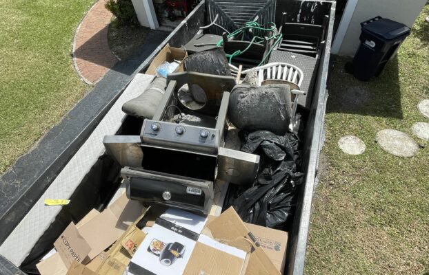 How can I target specific demographics or areas with my junk removal advertising?